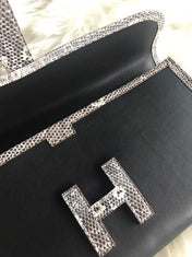 JIGE ELAN 29 CLUTCH IN BLACK CALFSKIN WITH WHITE LIZARD SKIN