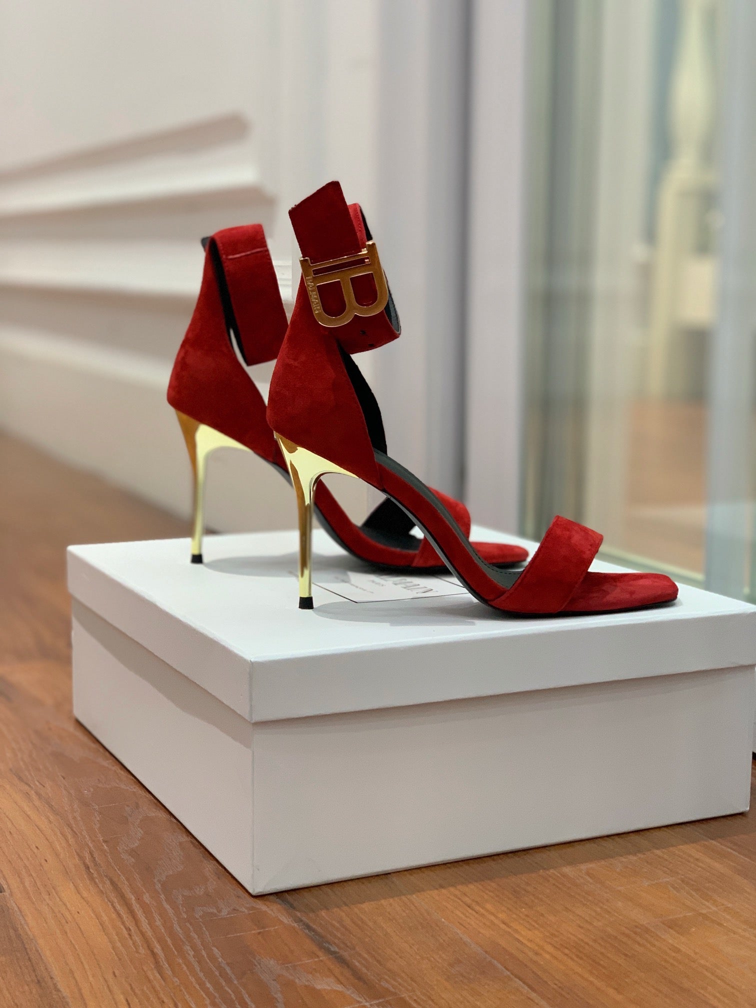 BALMAIN 25S THIN STRAP HIGH HEELS 105MM IN DARK RED SUEDE GOLD HARDWARE
