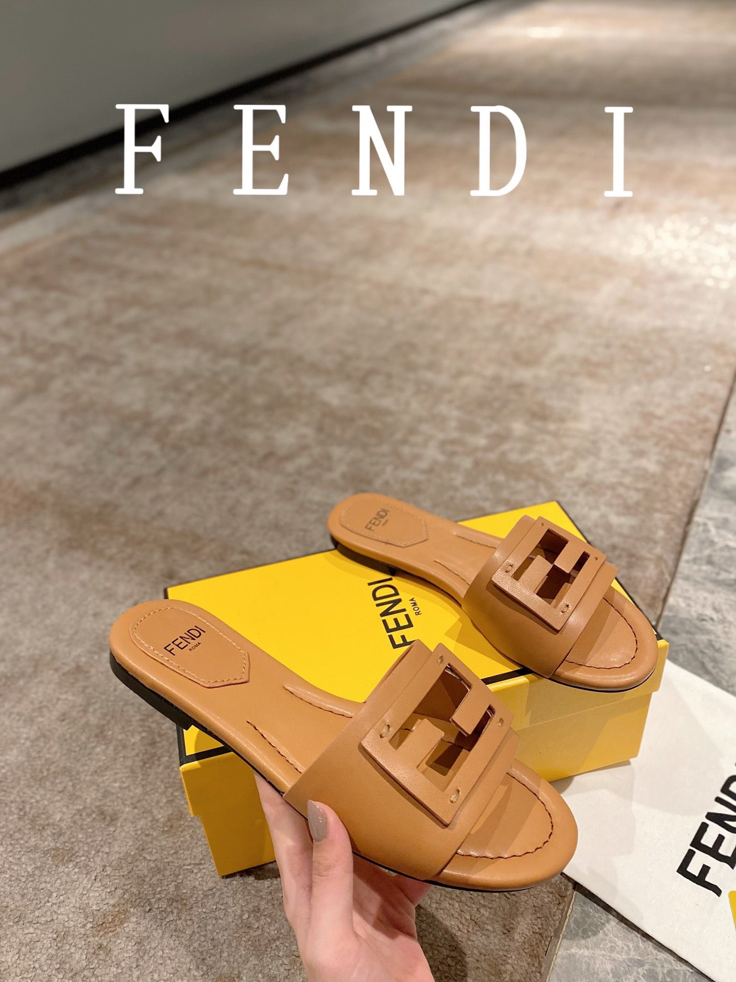 FENDI BAGUETTE SLIDES IN  COPPER BROWN LAMBSKIN