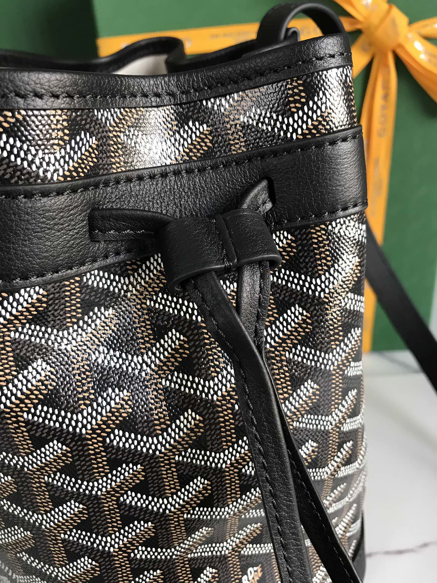 PETIT FLOT BUCKET BAG 22 IN BLACK GOYARDINE CANVAS AND LAMBSKIN TRIM