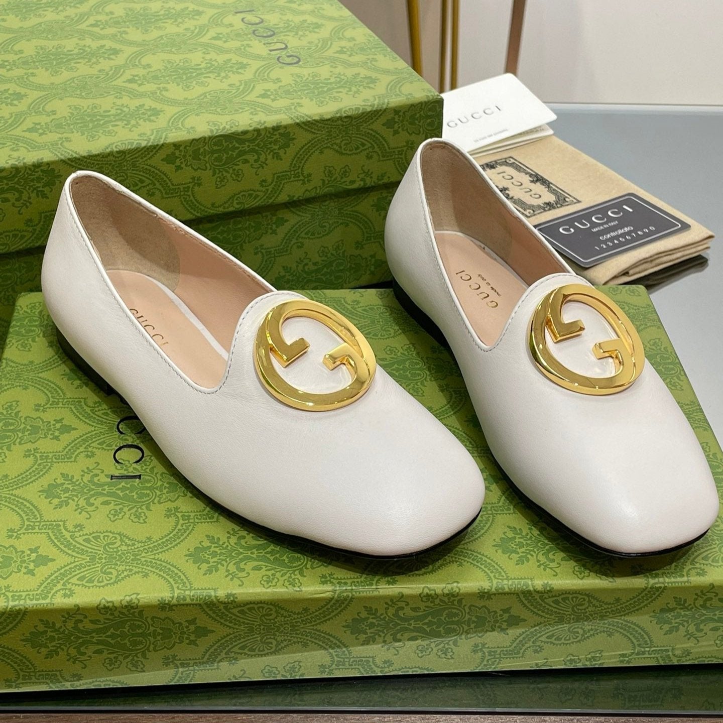 BLONDIE LOGO-PLAQUE LOAFERS IN WHITE CALFSKIN WITH GOLD HARDWARE