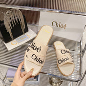 WOODY SLIPPER IN BEIGE MIX BLACK CANVAS