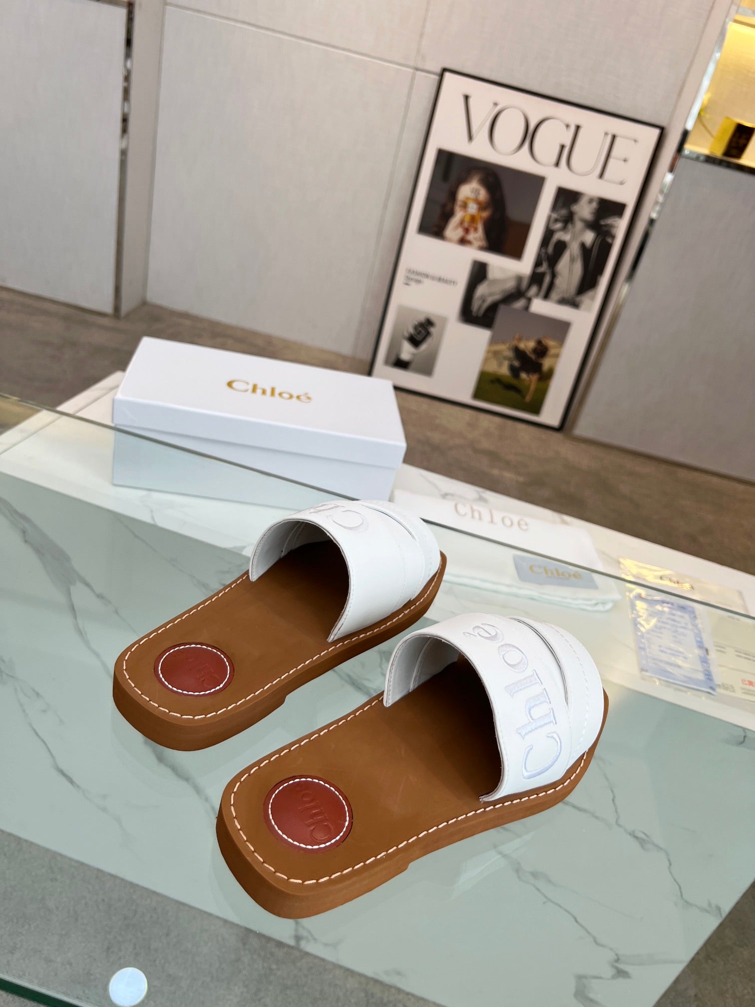 WOODY MULE IN WHITE LAMBSKIN WITH EMBROIDERED LOGO