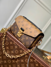 POCHETTE MÉTIS EAST WEST 21.5 IN BROWN MONOGRAM COATED CANVAS AND CALFSKIN