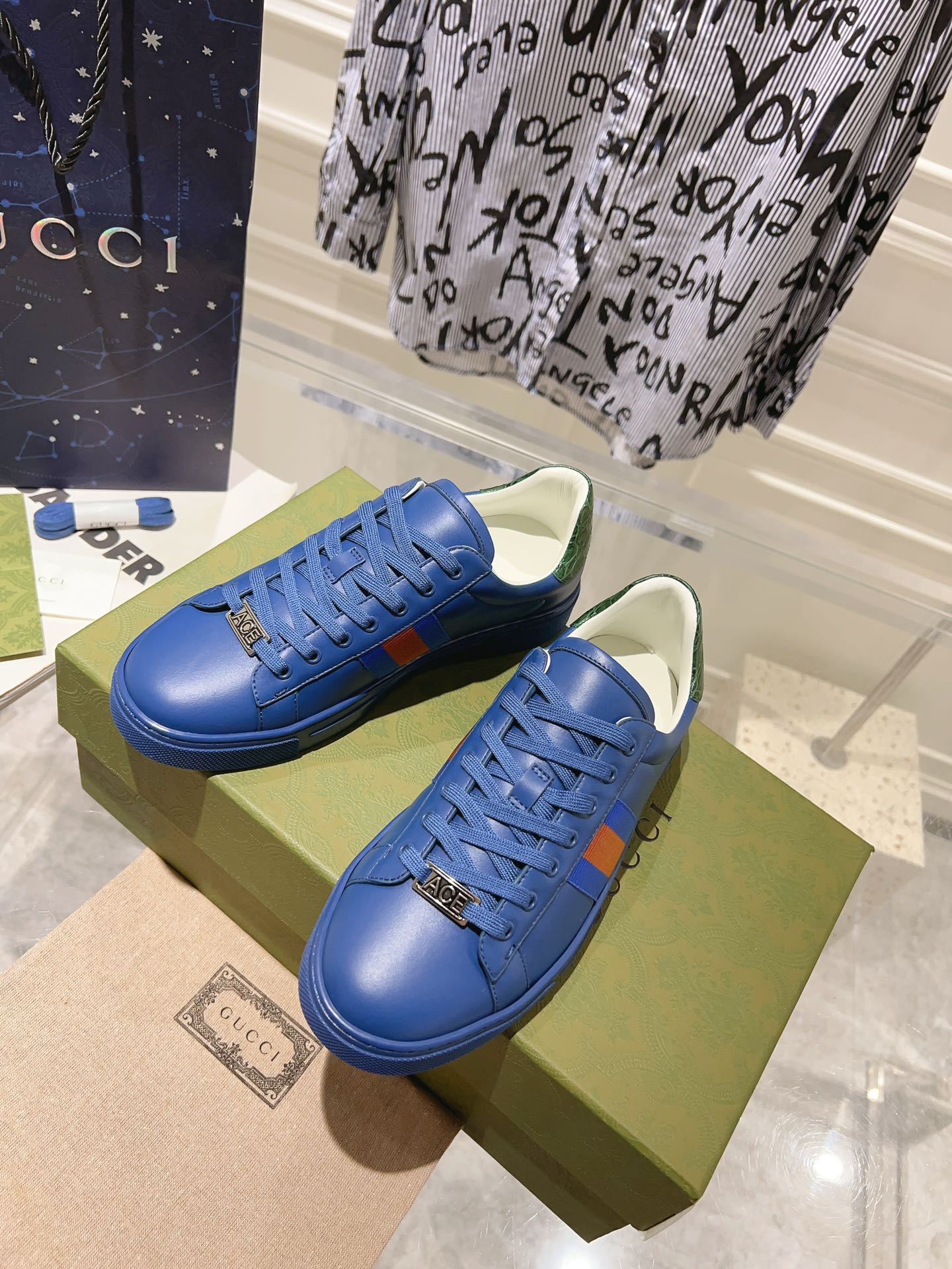 GG ACE GG SUPREME TRAINER AZURE CALFSKIN