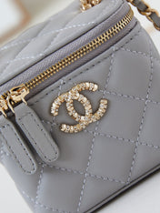 CHANEL 25S MINI VANITY BAG 11 CM IN GREY LAMBSKIN WITH CRYSTAL-EMBELLISHED CC LOGO