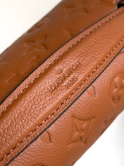 POCHETTE MÉTIS 25 IN COGNAC MONOGRAM EMPREINTE LEATHER GOLD HARDWARE