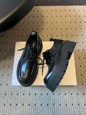 CELINE 26S LACE-UP LOAFERS IN BLACK CALFSKIN