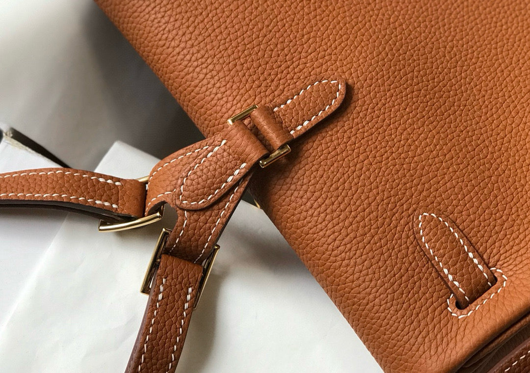 KELLY ADO 22 TOGO BACKPACK IN BROWN CALFSKIN GOLD HARDWARE