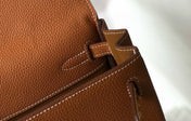 KELLY ADO 22 TOGO BACKPACK IN BROWN CALFSKIN GOLD HARDWARE