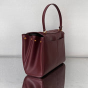 RODEO MEDIUM BAG 35 IN BURGUNDY SMOOTH CALFSKIN GOLD HARDWARE