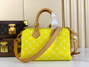 SPEEDY P9 BANDOULIÈRE 25 IN YELLOW MONOGRAM CALFSKIN