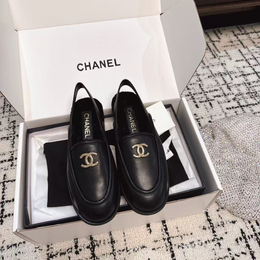 SLINGBACK LOAFER IN BLACK CALFSKIN AND SHEARLING