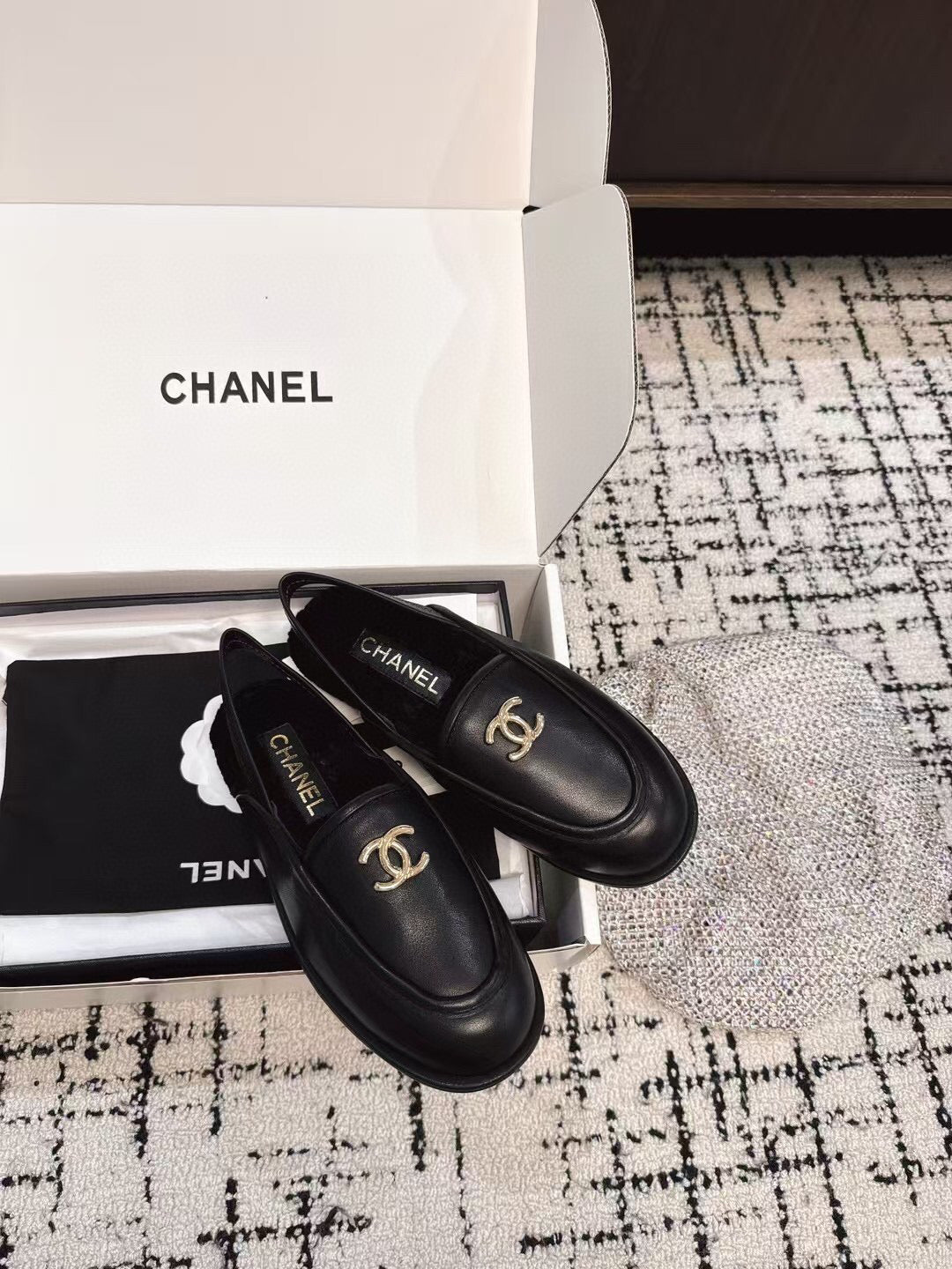 SLINGBACK LOAFER IN BLACK CALFSKIN AND SHEARLING