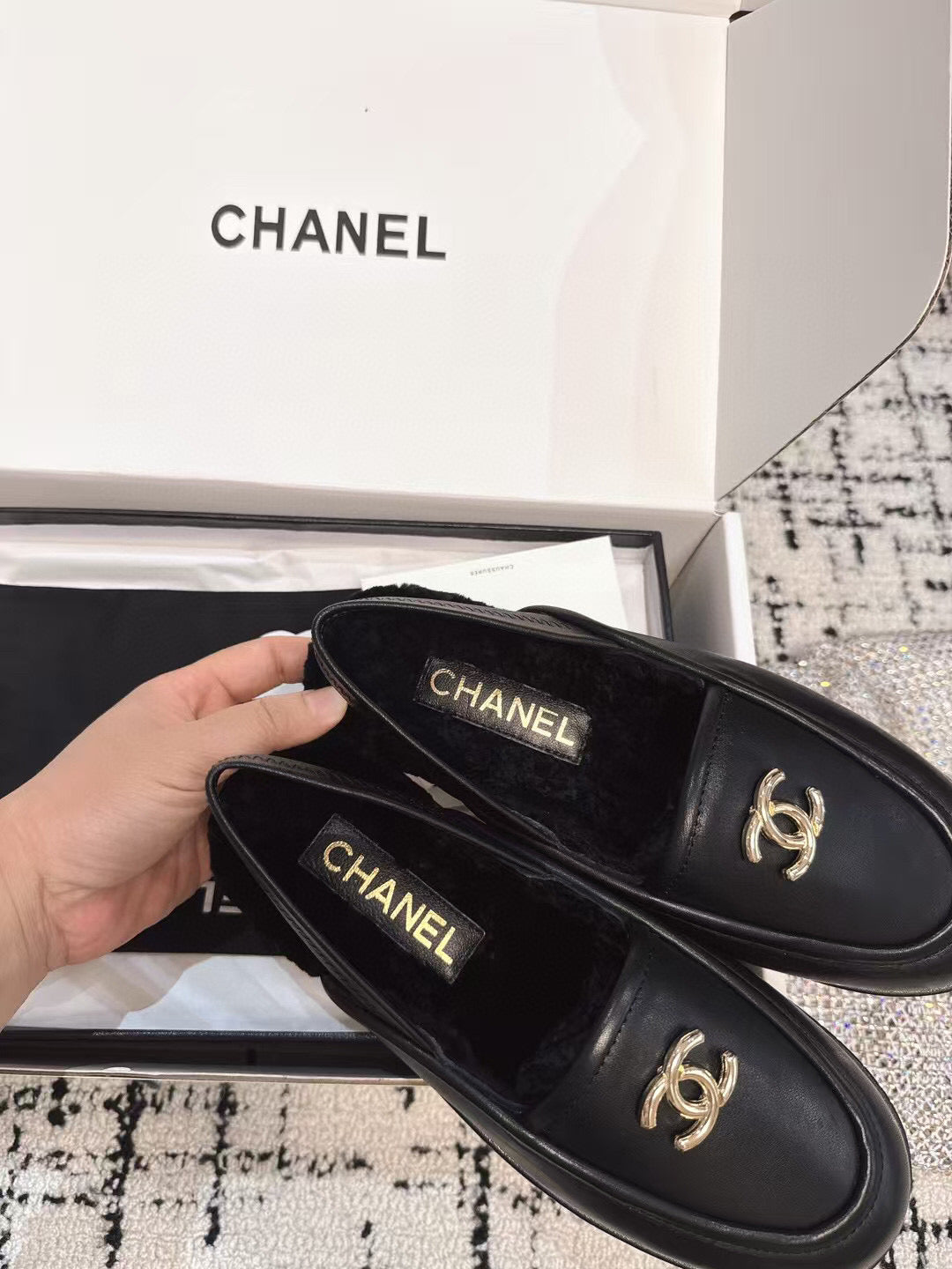 SLINGBACK LOAFER IN BLACK CALFSKIN AND SHEARLING