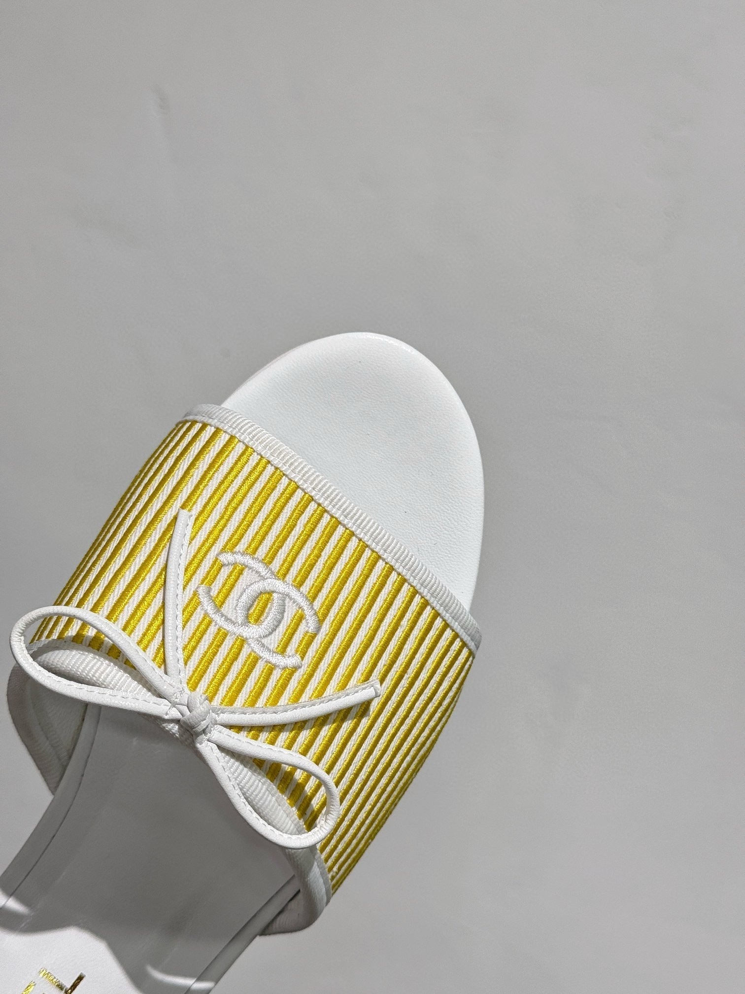 CC STRIPED SLIDE SANDALS IN YELLOW AND WHITE CANVAS