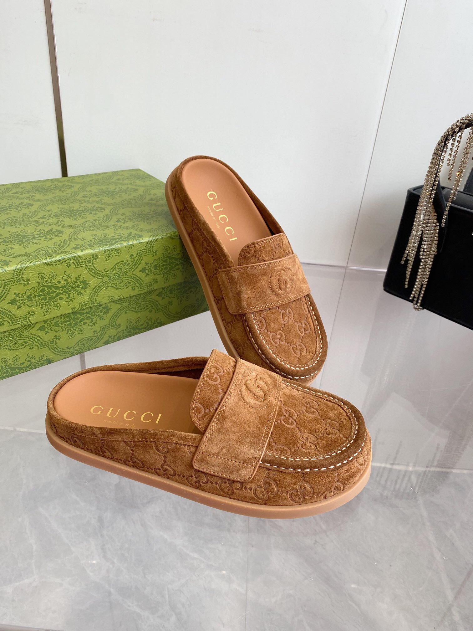 GG LOAFERS IN BROWN MONOGRAM EMBOSSED SUEDE