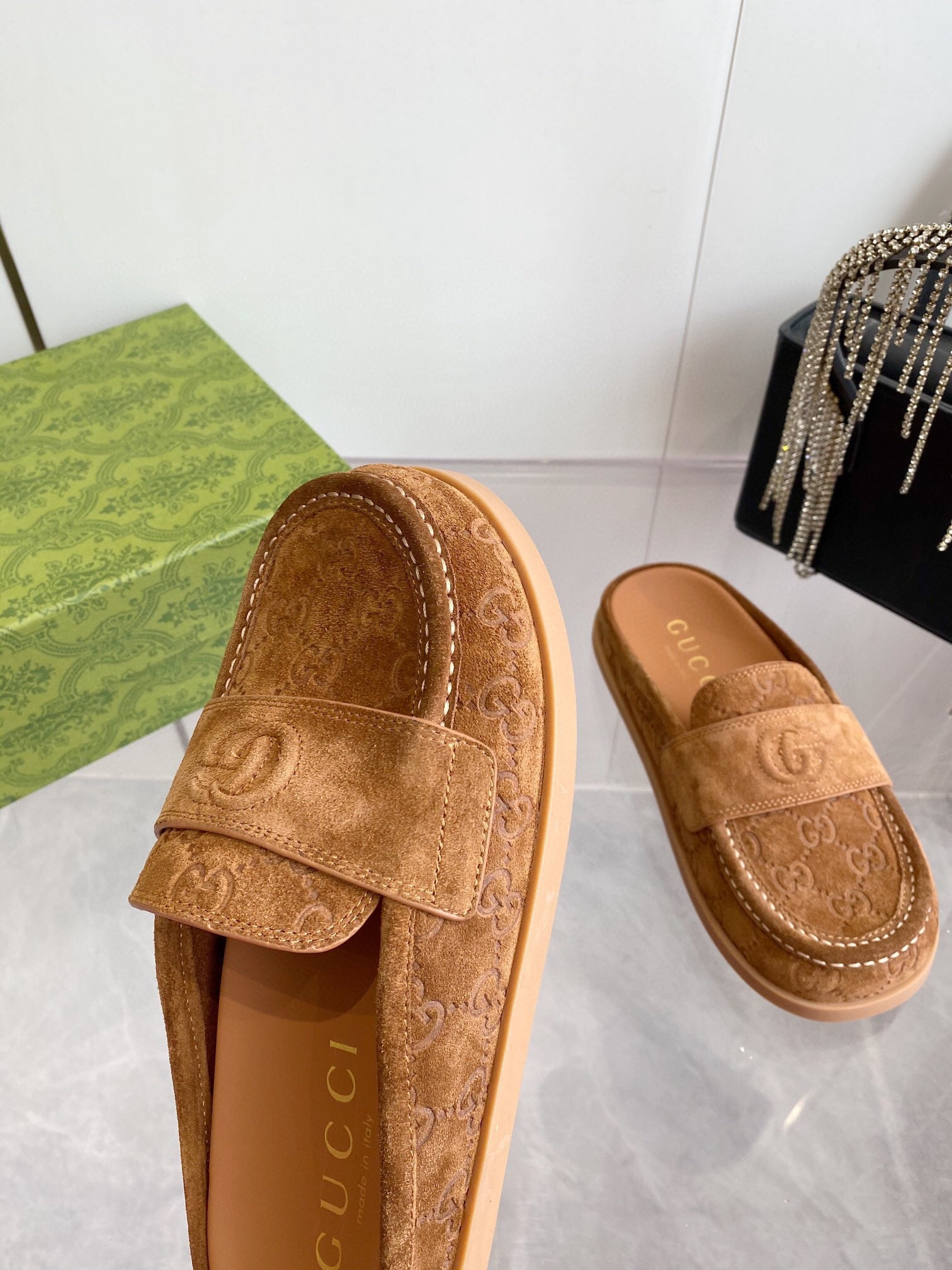 GG LOAFERS IN BROWN MONOGRAM EMBOSSED SUEDE