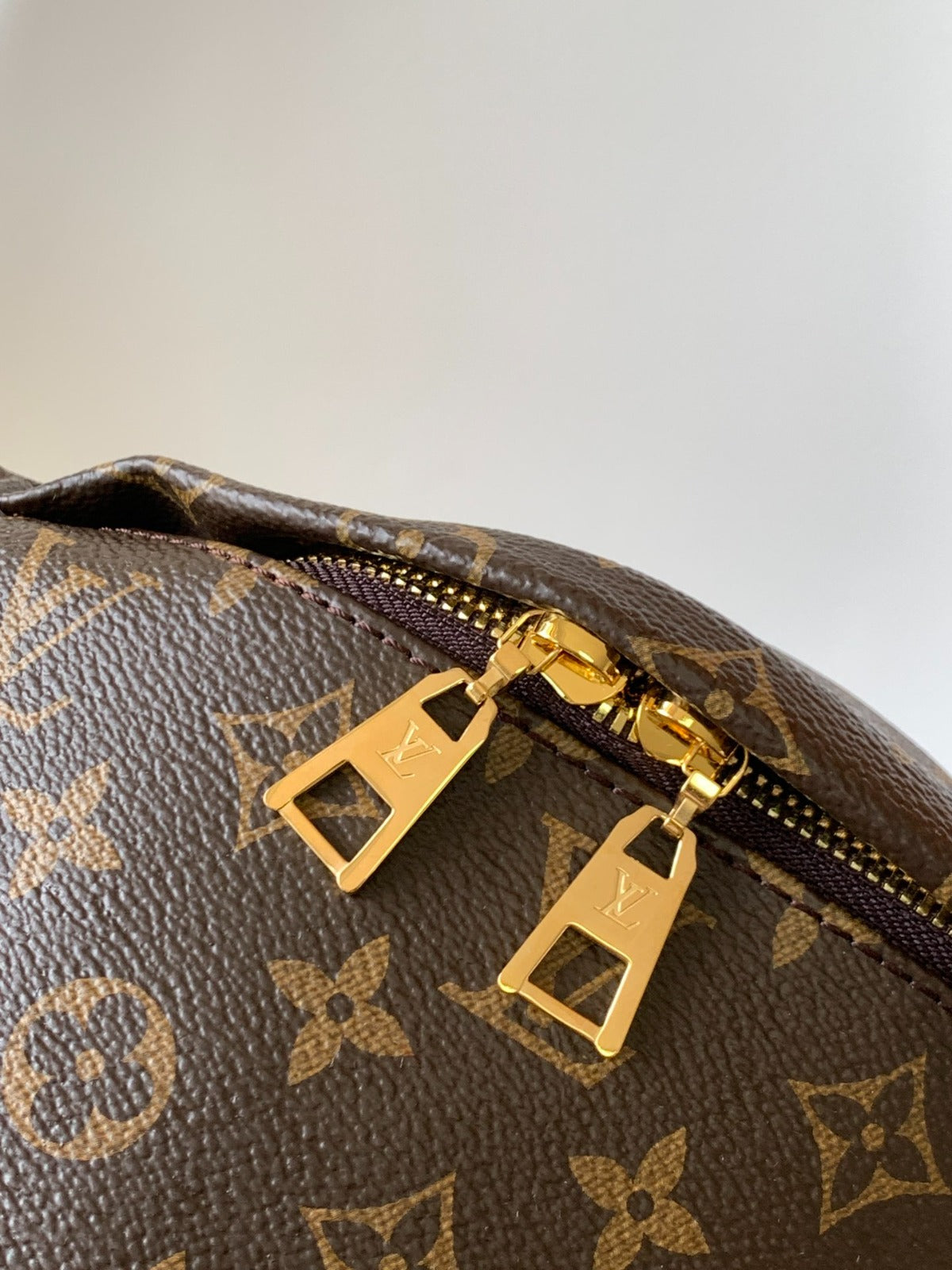 LV BUMBAG 37 IN BROWN COATED MONOGRAM CANVAS