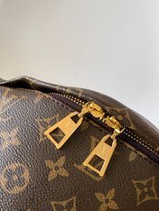 LV BUMBAG 37 IN BROWN COATED MONOGRAM CANVAS
