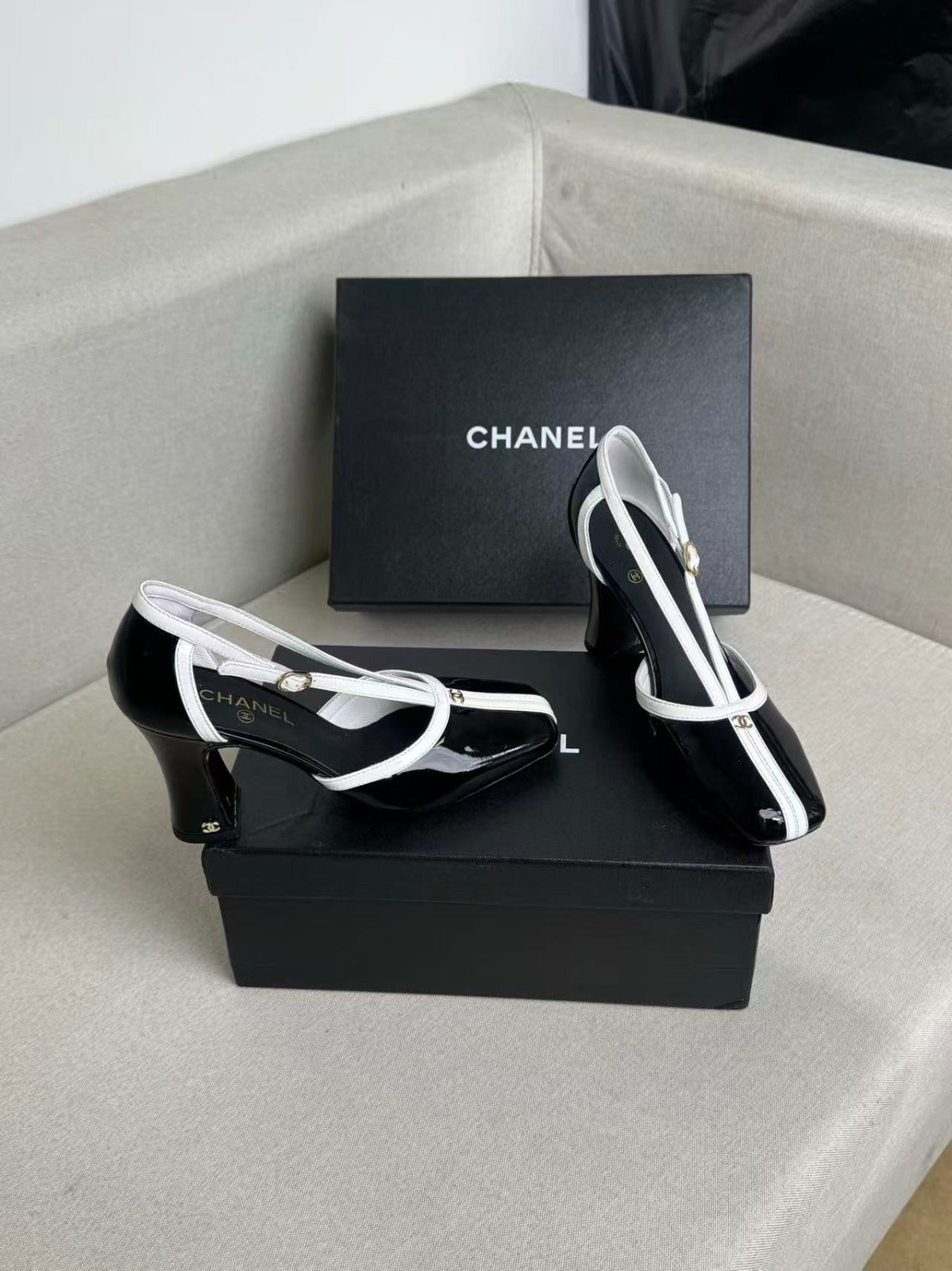 CHANEL 26S MARY JANES 85MM IN BLACK AND WHITE PATENT CAFLSKIN