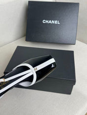 CHANEL 26S MARY JANES 85MM IN BLACK AND WHITE PATENT CAFLSKIN