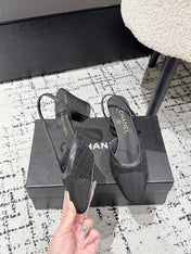 HIGH SLINGBACK 25S IN BLACK FABRIC AND CALFSKIN