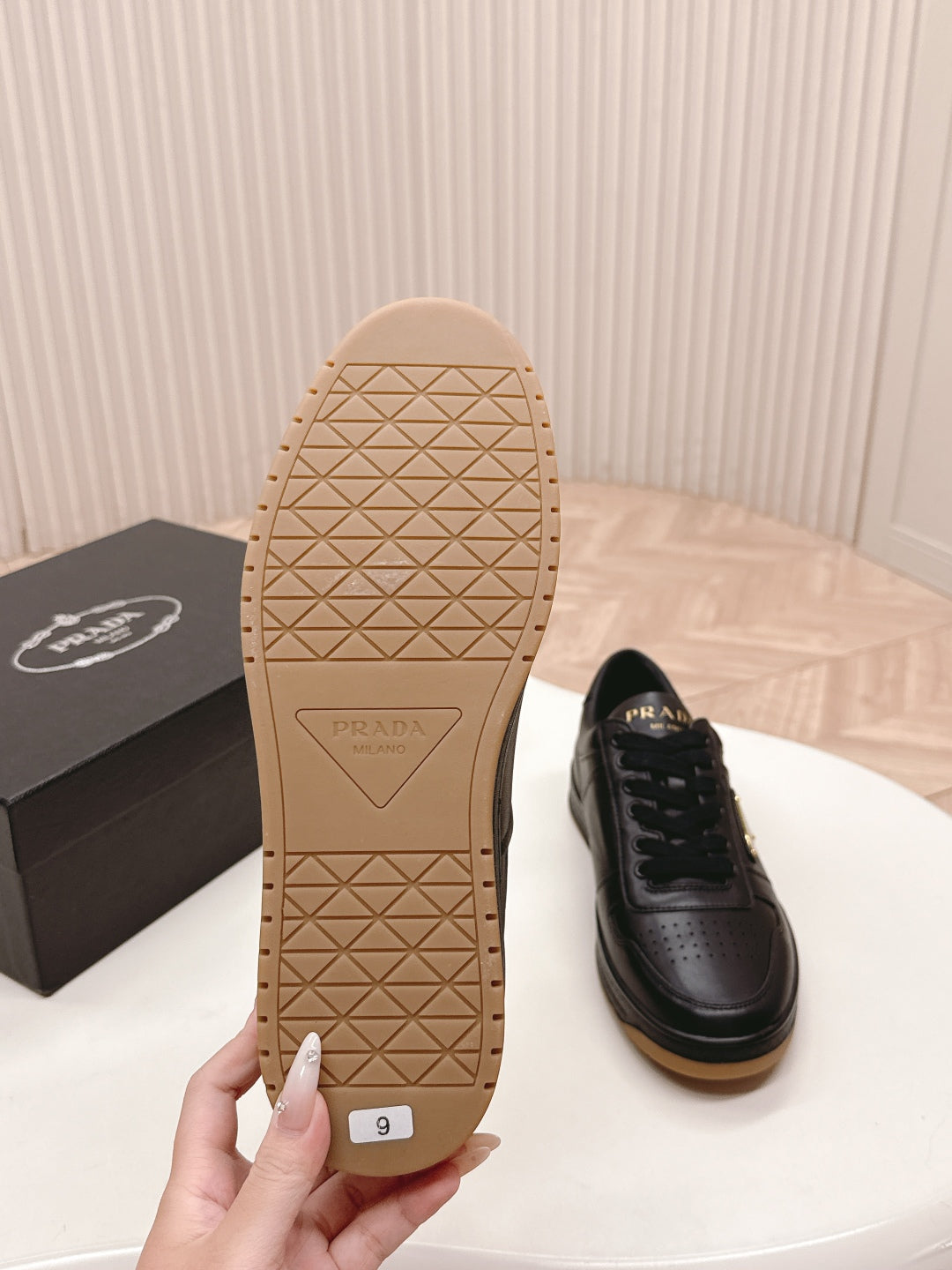 PRADA 25S DOWNTOWN SNEAKERS IN BLACK CALFSKIN