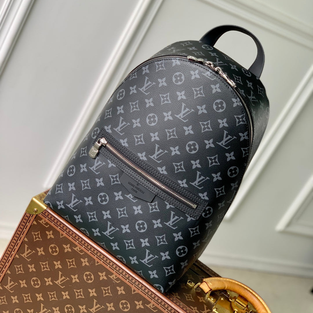 DISCOVERY SLIM BACKPACK 38 IN BLACK MONOGRAM ECLIPSE COATED CALFSKIN
