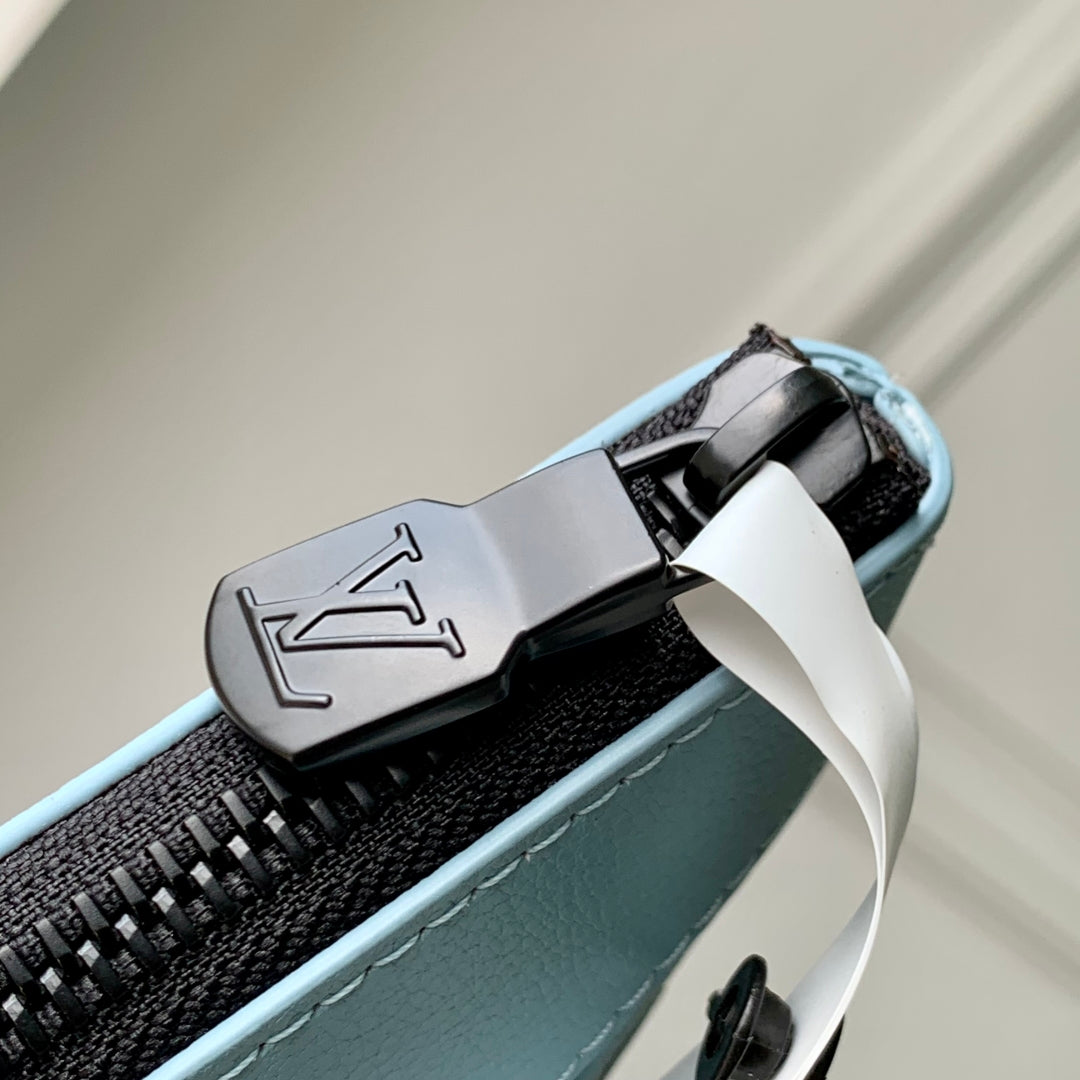 POCHETTE TO GO 30 IN SKY BLUE MONOGRAM SHADOW CALFSKIN EMBOSSED LOGO