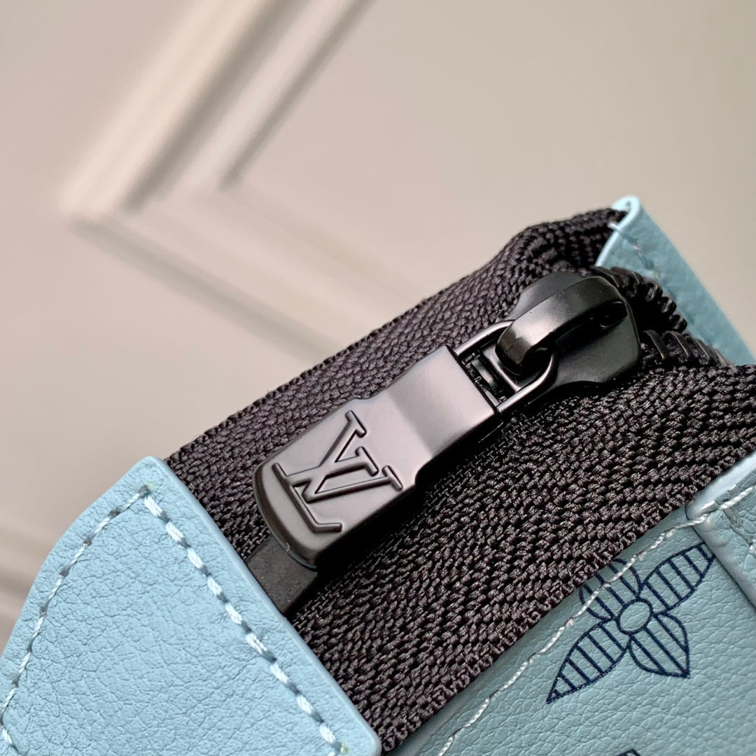 GASTON WEARABLE WALLET 22 IN SKY BLUE MONOGRAM SHADOW CALFSKIN EMBOSSED LOGO