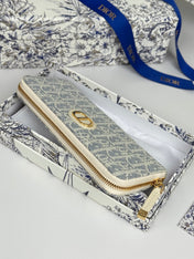 DIOR 25S LONG ZIPPER WALLET 19 IN LIGHT BLUE OBLIQUE JACQUARD CANVAS