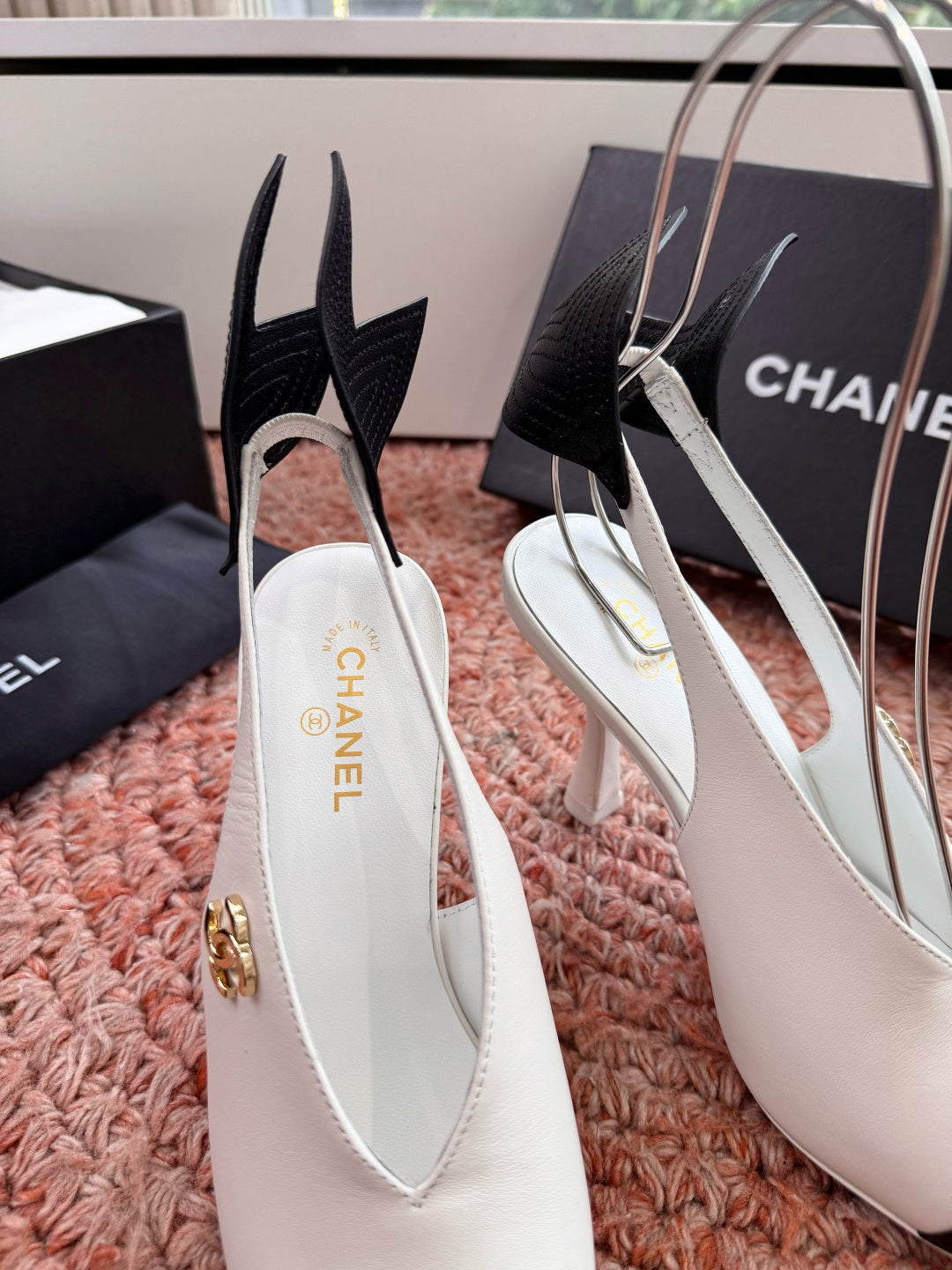 CHANEL 26S POINTED TOE HIGH HEEL SLINGBACKS IN WHITE LAMBSKIN WITH BLACK FLORAL APPLIQUE