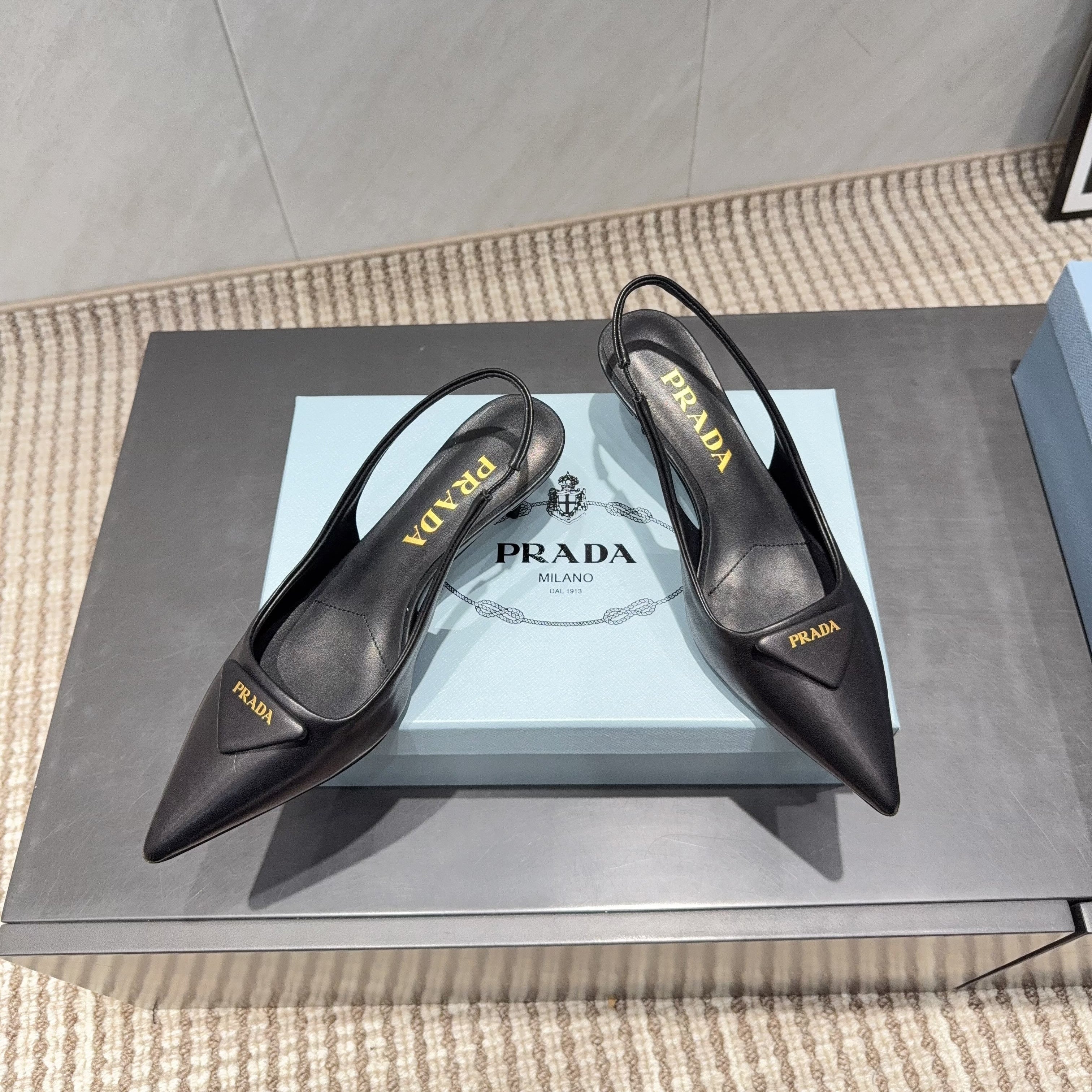 PRADA 26S POINTED TOE SLINGBACK HIGH HEELS 55MM IN BLACK SHEEPSKIN WITH LOGO
