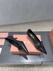 MIUMIU 26S POINTED TOE PUMPS 55MM IN BLACK CALFSKIN WITH BOW