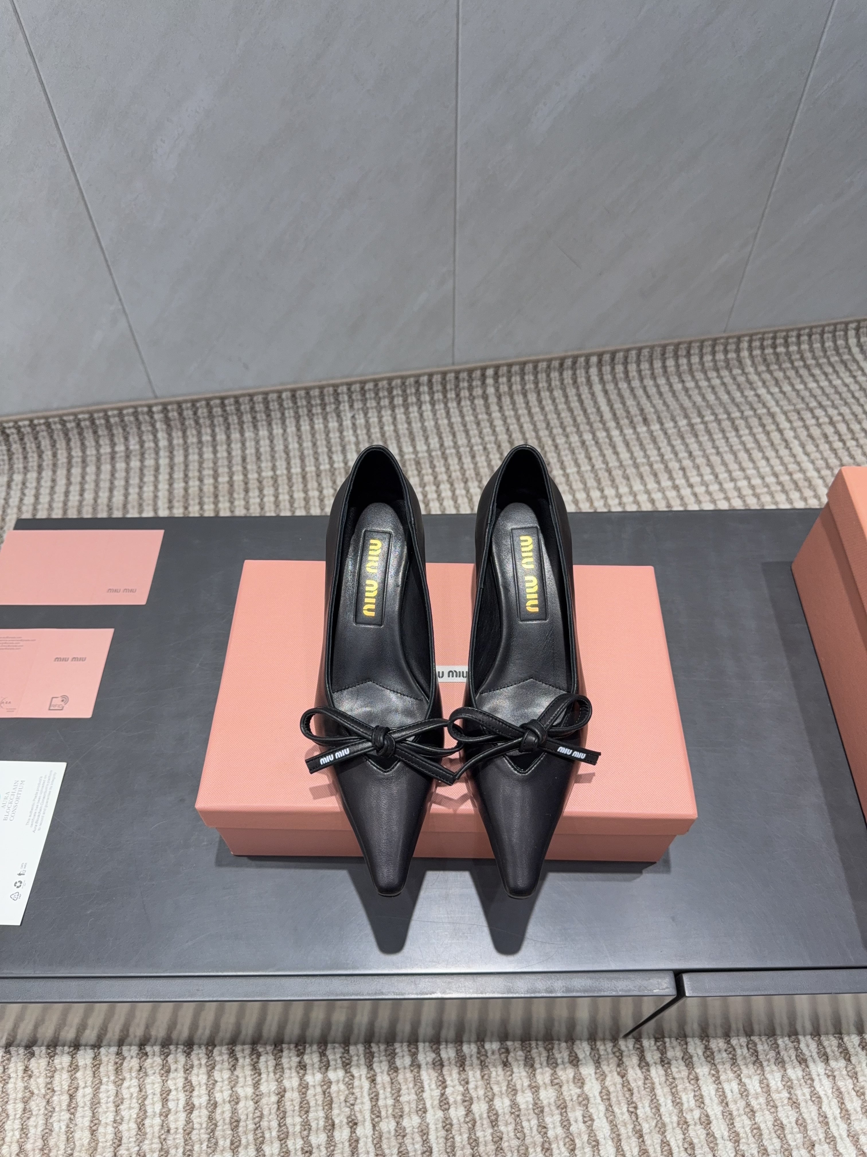 MIUMIU 26S POINTED TOE PUMPS 55MM IN BLACK CALFSKIN WITH BOW