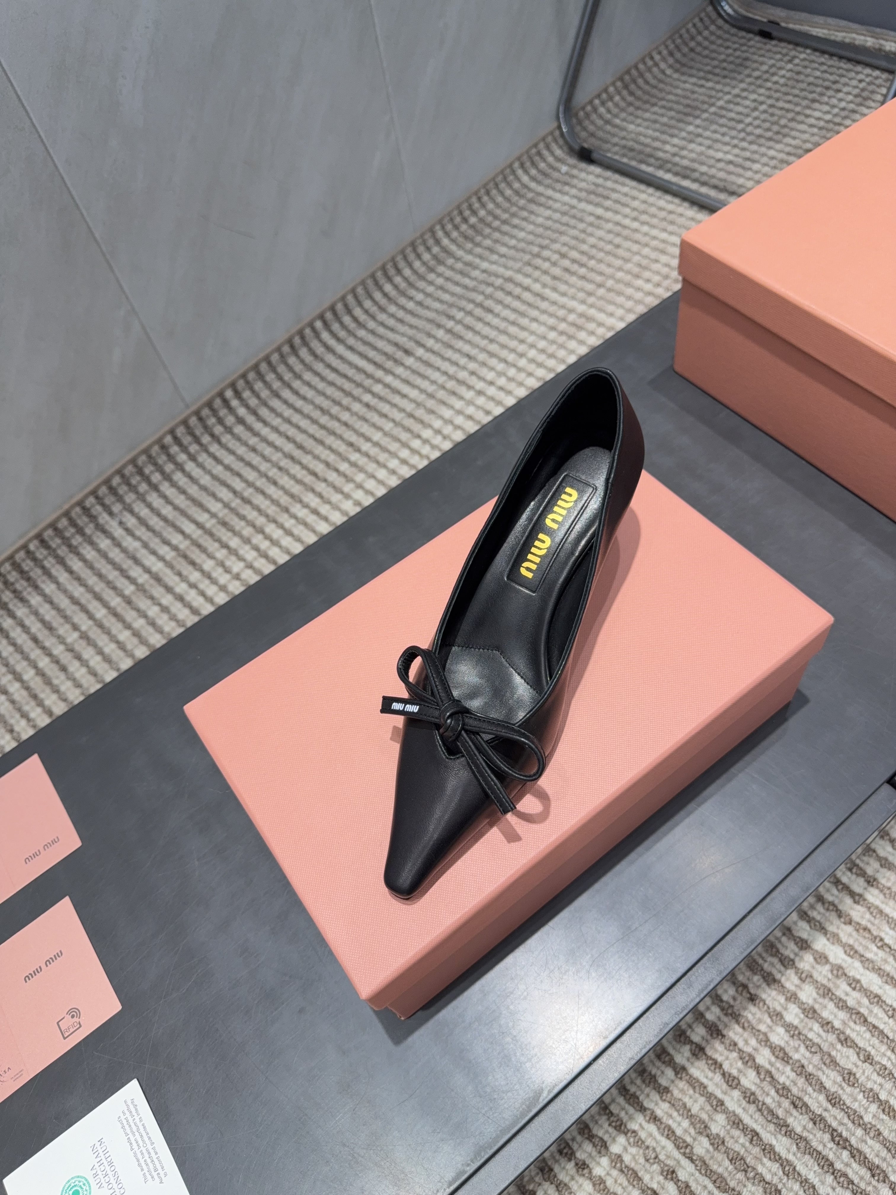 MIUMIU 26S POINTED TOE PUMPS 55MM IN BLACK CALFSKIN WITH BOW
