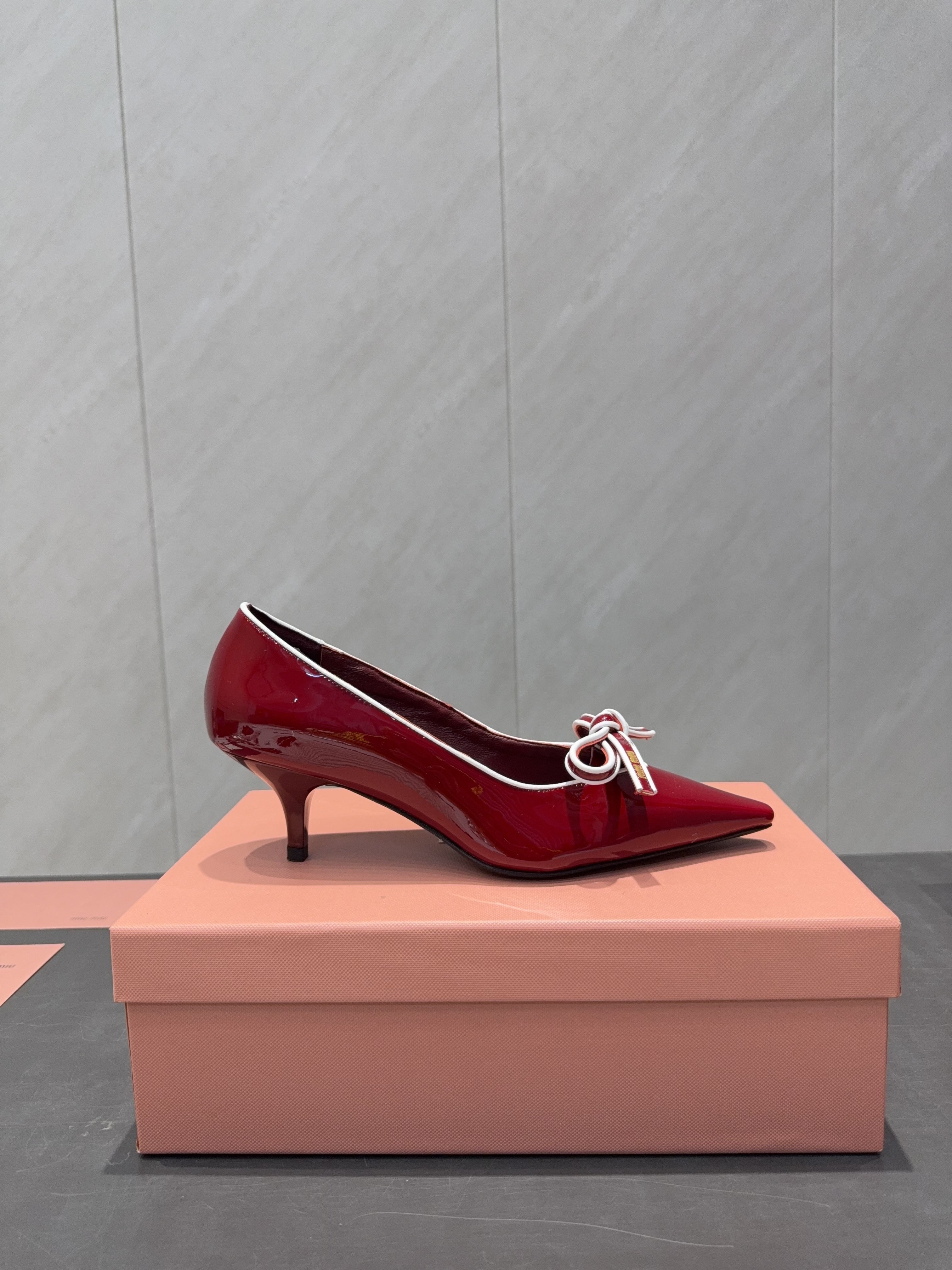 MIUMIU 26S POINTED TOE PUMPS 55MM IN DARK RED CALFSKIN WITH BOW
