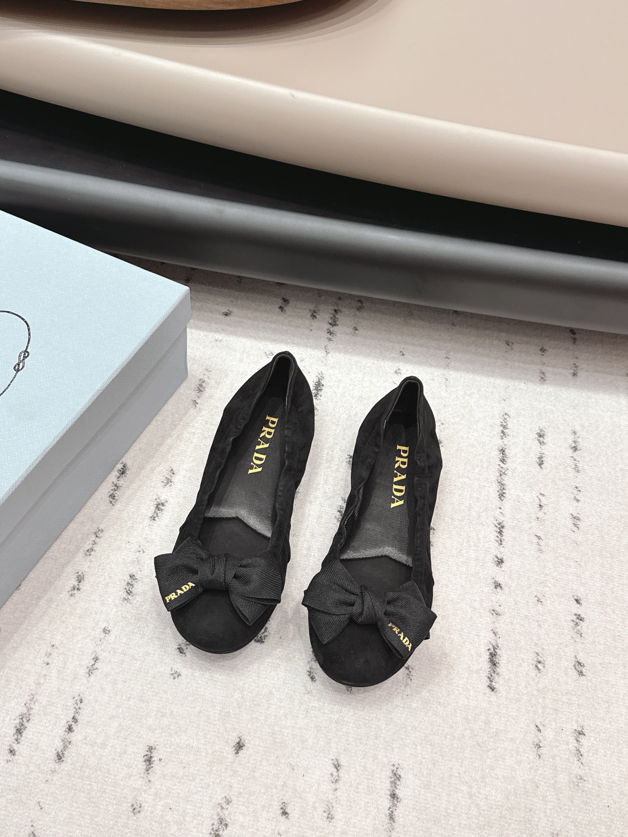 PRADA 26S ROUND TOE FLATS WITH BOW IN BLACK SUEDE
