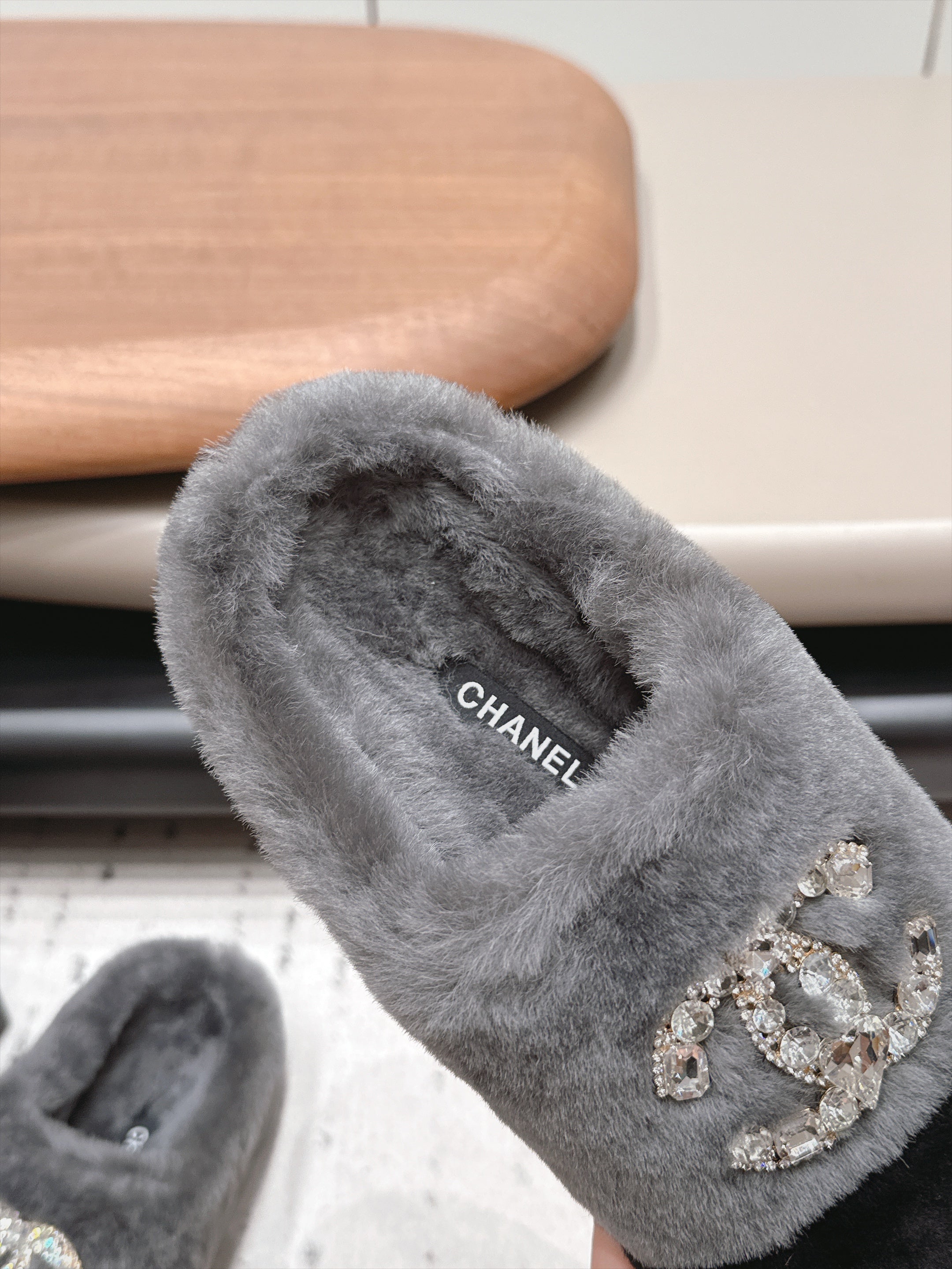 CHANEL 26S MULES IN GREY AND BLACK SHEARLING WITH ROUND TOE