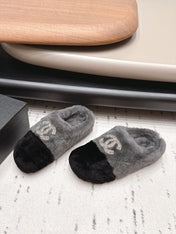 CHANEL 26S MULES IN GREY AND BLACK SHEARLING WITH ROUND TOE