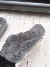 CHANEL 26S MULES IN GREY AND BLACK SHEARLING WITH ROUND TOE