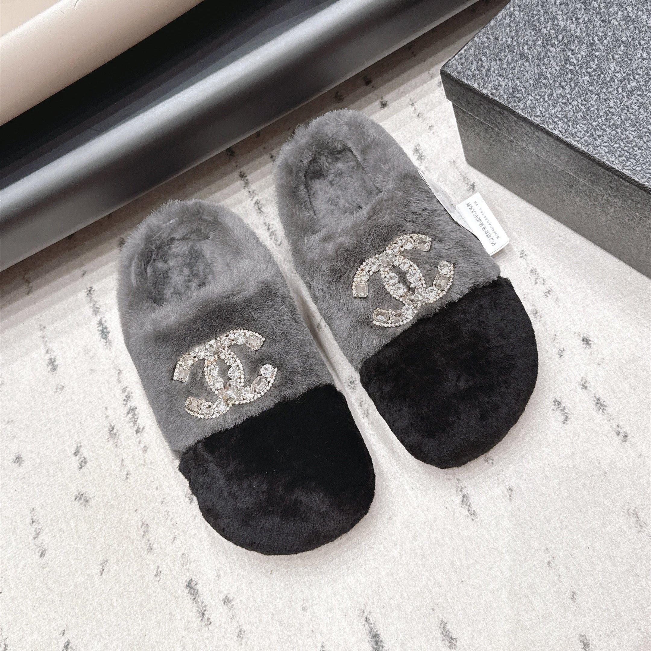 CHANEL 26S MULES IN GREY AND BLACK SHEARLING WITH ROUND TOE