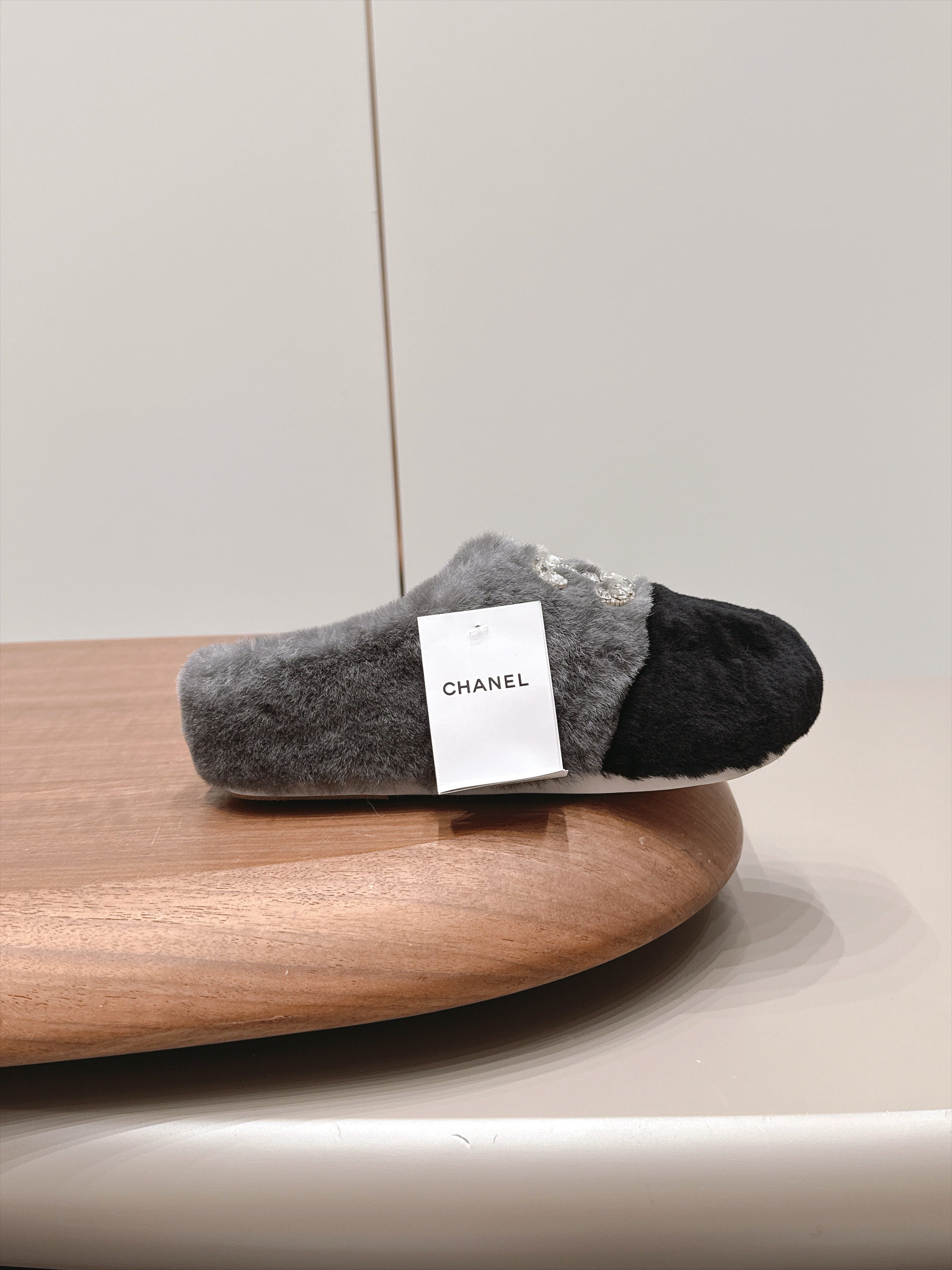 CHANEL 26S MULES IN GREY AND BLACK SHEARLING WITH ROUND TOE