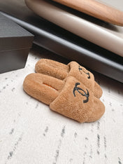 CHANEL 26S SLIDE MULES IN BROWN SHEARLING AND BLACK CC LOGO