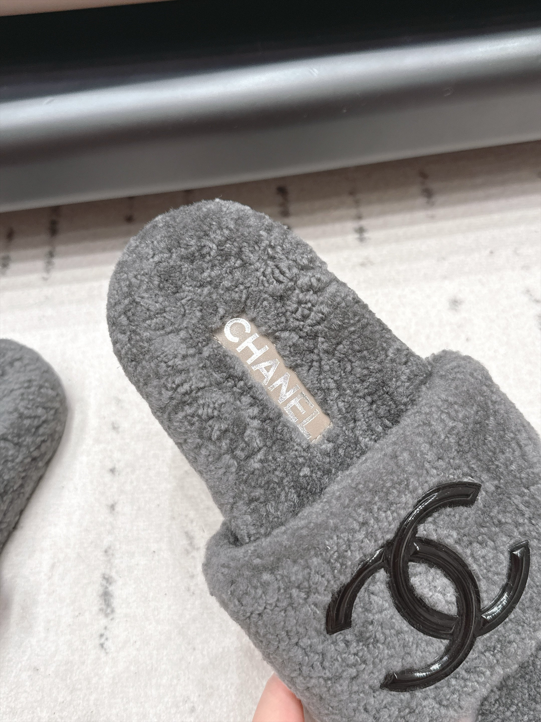 CHANEL 26S SLIDE MULES IN GREY SHEARLING AND BLACK CC LOGO