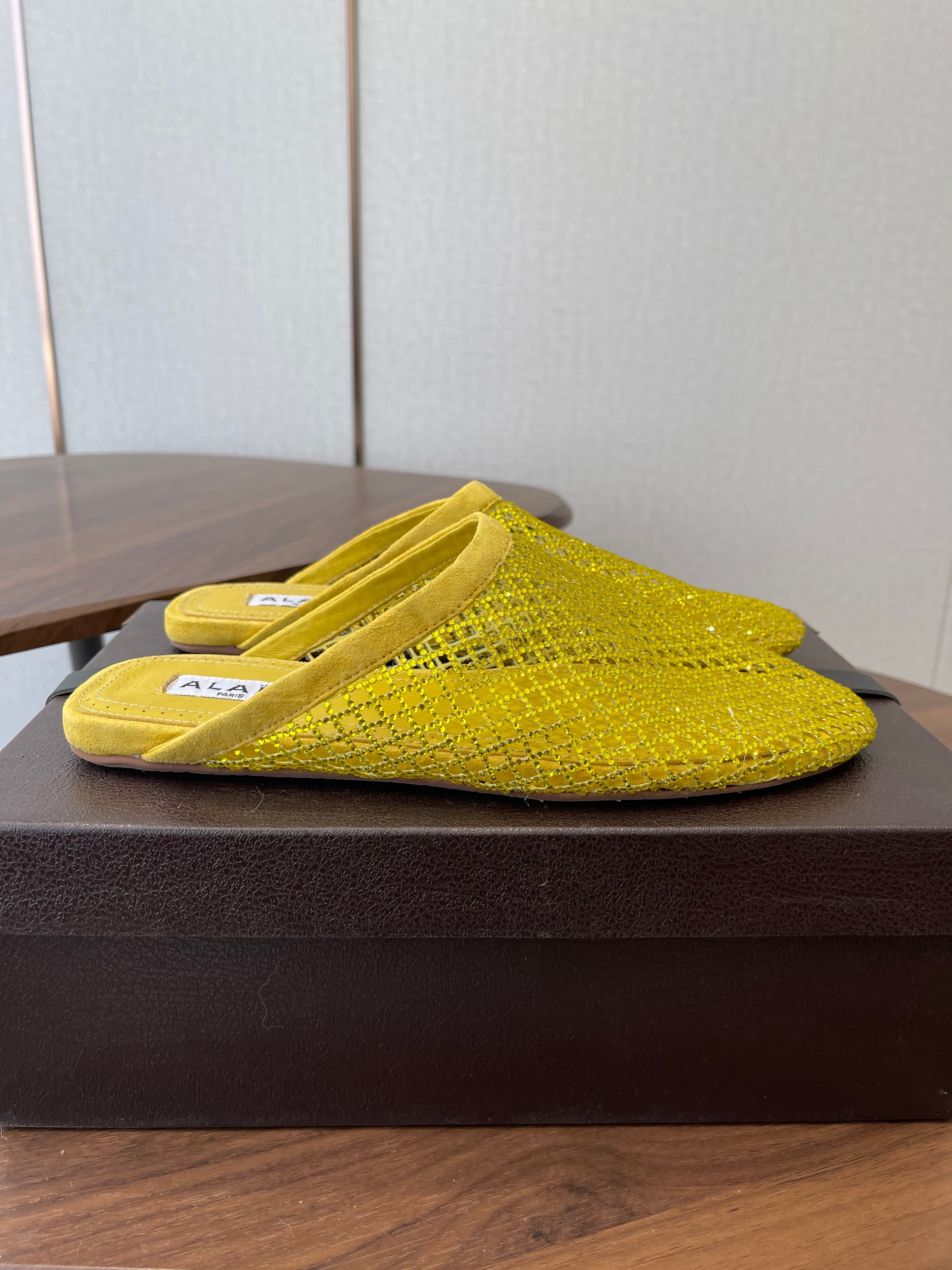 ALAIA 26S FLAT MULES IN DARK YELLOW SUEDE AND MESH RHINESTONE-EMBELLISHED