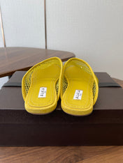 ALAIA 26S FLAT MULES IN DARK YELLOW SUEDE AND MESH RHINESTONE-EMBELLISHED