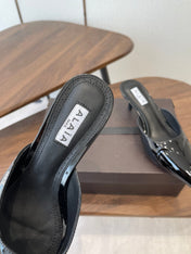 ALAIA 26S HEELED MULES 50 MM IN BLACK GLOSSY CALFSKIN