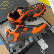 PRADA 26S CLOUDBUST THUNDER SNEAKERS 60MM IN ORANGE RED MESH FABRIC AND TPU